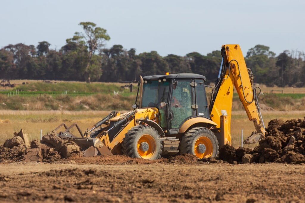 Mini Excavator at work in residential estate construction.